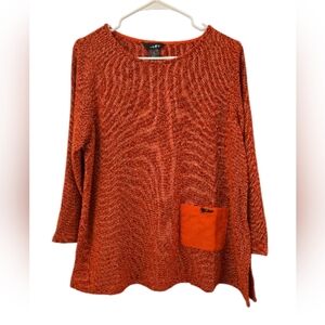 ALI MILES TEXTURED PULLOVER TUNIC/ A PATCH POCKET IN BURNT ORANGE. SIZE LARGE.